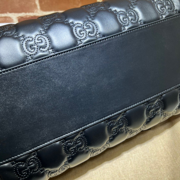 G*u*i gg matelassé leather top handle bag