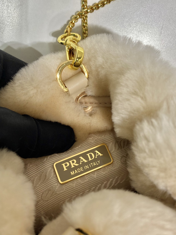 Pra*a shearling bucket bag