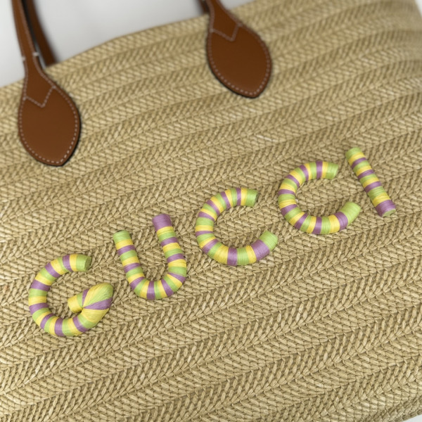 G*u*i medium straw-effect tote