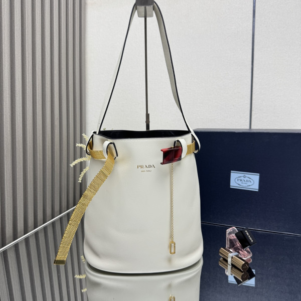 Pra*a buckle leather bucket bag with jeweled belt