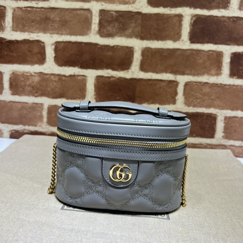 G*u*i gg matelassé top handle mini bag