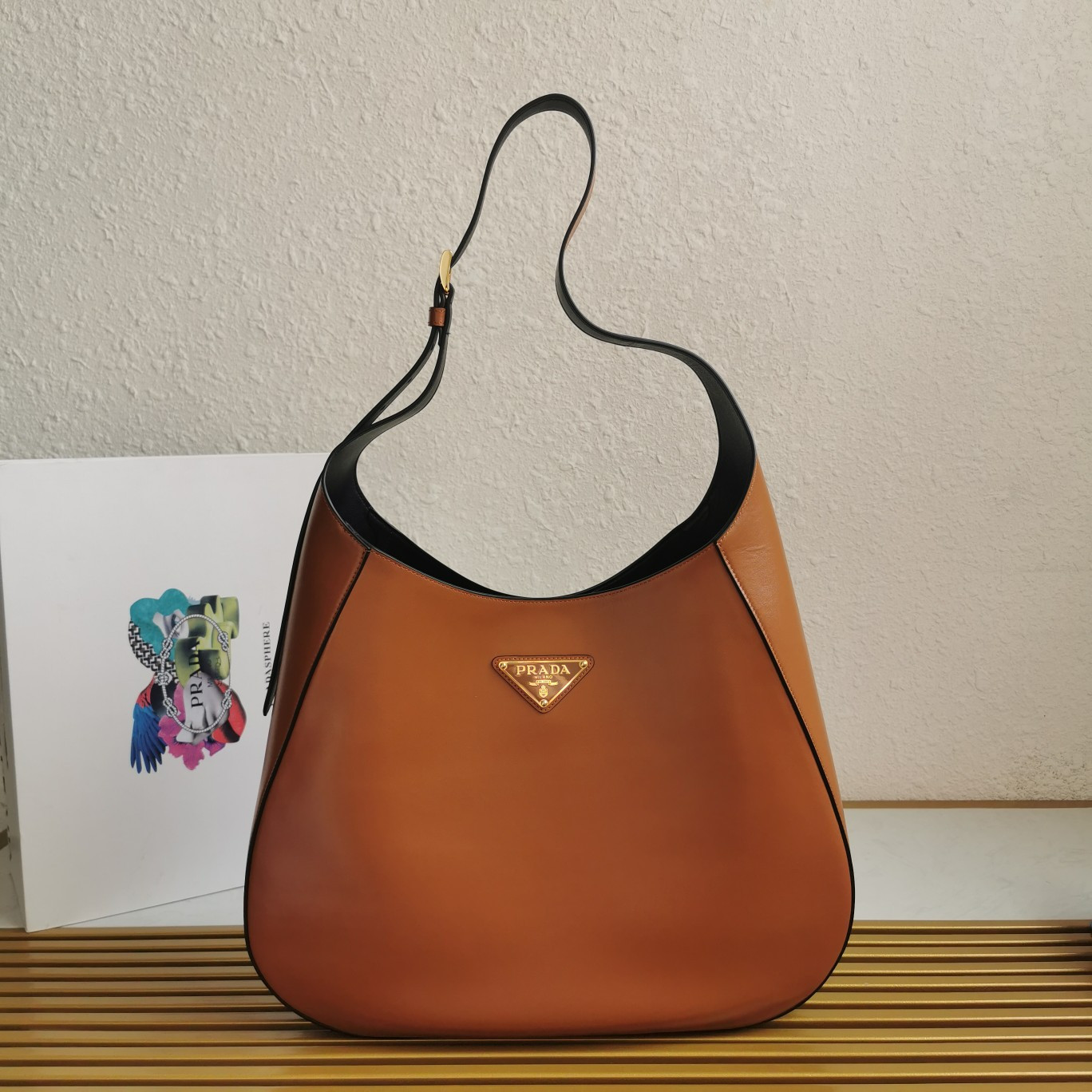 Pra*a large leather shoulder bag with topstitching